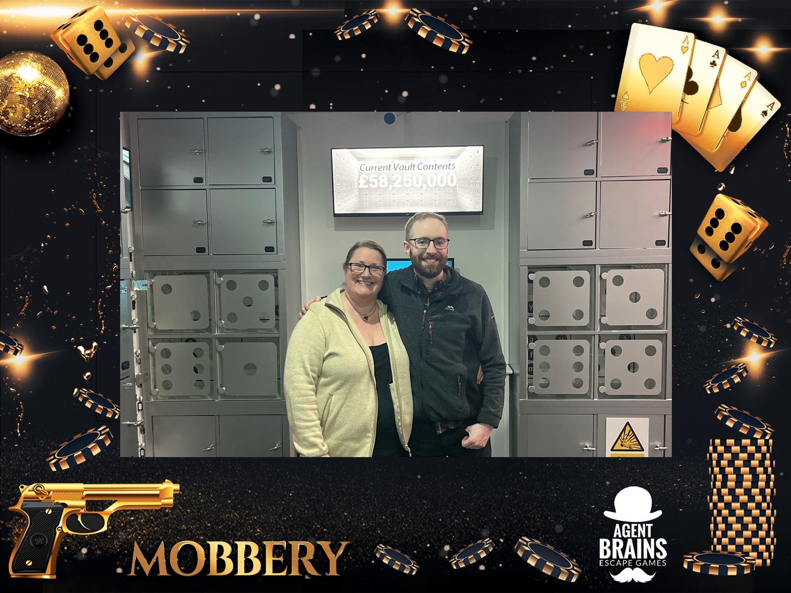 Anthony and Trenna pose after Mobery at Agent Brains, inside the Mobbery vault-themed photo frame.